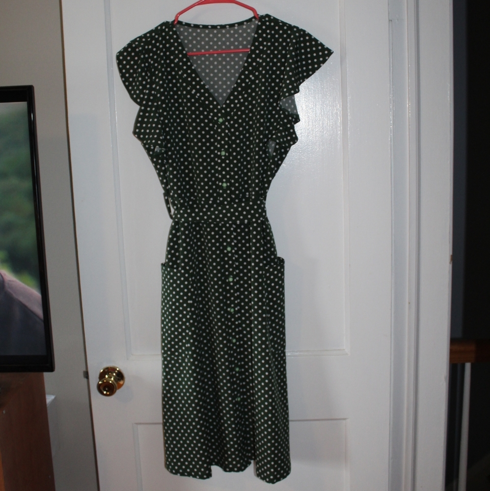 Green and white polka dot flutter sleeve dress